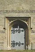 Gothic Survival west door to 17th-century tower