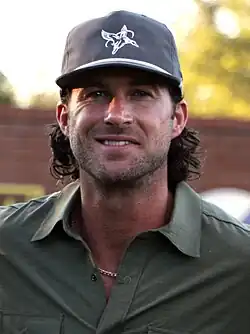 A head shot of Riley Green.