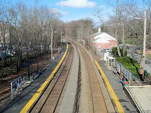 A railway station with low-level side platforms viewed from above