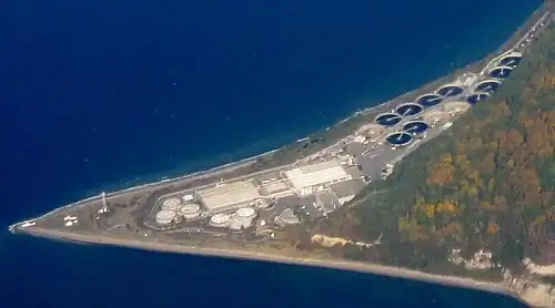 Overhead view of a peninsula and the treatment plant