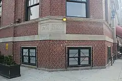 The cornerstone at the base of the octagonal tower. The cornerstone bears the engraving "A.D. 1907"