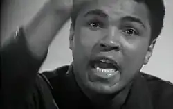 Talking man facing camera