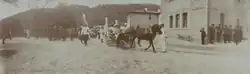 The empress Alexandra and her children departing on a carriage from the royal garage and going to Yalta in order to sell white flowers, May 3, 1914.