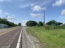 Wilcox, Missouri sign on US 71/US 136, facing northwest