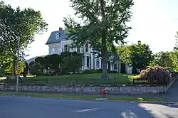 The easterly facade of the house, with its eponymous wisteria hanging gardens