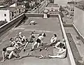 Women boxing on a rooftop in the 1930s