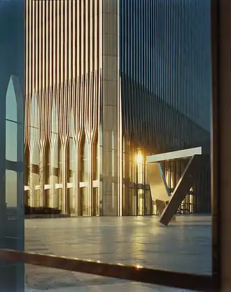 Exterior entrance trident columns with Ideogram sculpture