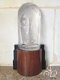 Mask of a woman (clear) by C. C. Asch van Wijck 1929, height is 25.5&nbsp;cm with pedestal 38.5&nbsp;cm