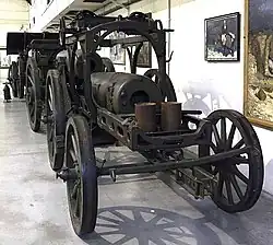 A Mrs 99 barrel on its transport wagon at the Royal Military Museum, Brussels.