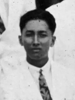 A young Malay man facing forwards
