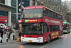 A double-decker bus on Route 12 at the north terminus on east plaza