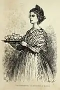 Een vrouw uit Valencia met de Spaanse drank Horchata. In het haar een Peineta. Gravure uit 1874 door Jean Charles Davillier.