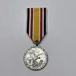 Voorzijde van de stalen medaille voor de non-combatanten