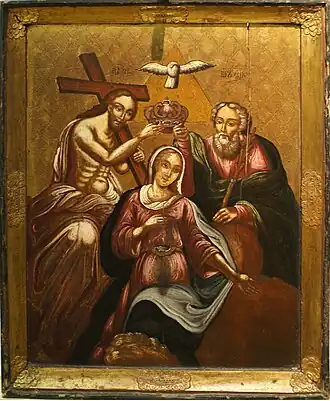 De Heilige Drie-eenheid, Vader, Zoon en Heilige Geest, kroont Maria op deze icoon