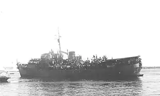 De Josiah Wedgwood met immigranten op het dek