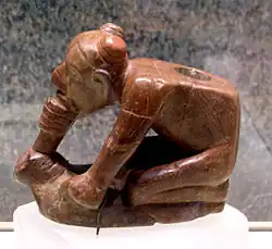 Effigy pijp van een figuur die rookt, Missouri flint klei