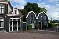 Woning met koetshuis
