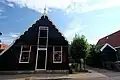 Houten huis (voorm. bakkerij)