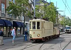 Werkwagen 2 met pekelaanhangwagen 14 tijdens de optocht van 5 juli 2014.