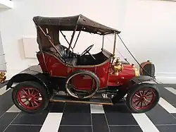 Spyker 7 HP uit 1912: phaeton met voorruit, deuren en kap