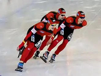 Schneider (midden) in 2009, tijdens de ploegenachtervolging samen met Robert Lehmann en Marco Weber