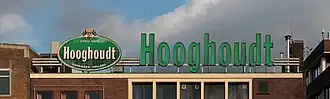 Lichtreclame voor Hooghoudt aan de Grote Markt op het vorige Vindicat-gebouw in Groningen (2012)