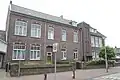 Voormalig schoolgebouw, thans klooster in Traditionalisme stijl