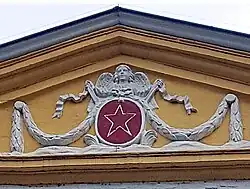 Stadsengel en stadswapen