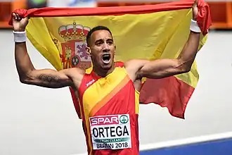 Orlando Ortega is blij met zijn bronzen medaille op de EK van 2018.