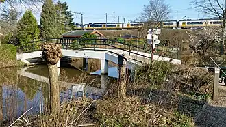 Brug 1970 met op de achtergrond spoorweg Amsterdam-Amersfoort (maart 2020)
