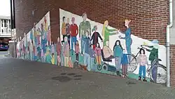 Muurschildering met losgeslagen ballon en pootafdruk (januari 2020)