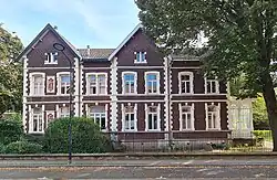 Nrs. 57-57a, westgevel