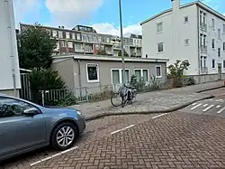 Blokje laagbouw met achtergevels Vrolikstraat (oktober 2022)