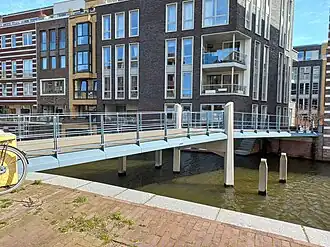 Kalmarbrug met brugnummer (5e randplaat van links) (maart 2023)