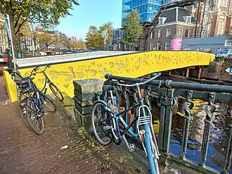 Grachtenvlinder met rechts Westerkerk (november 2023)