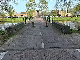 Brug 1149 met links daarachter Kerkcentrum De Nieuwe Stad (april 2024)