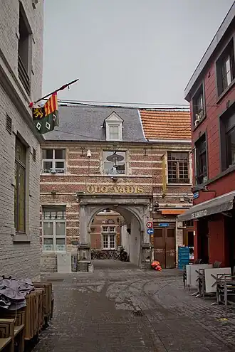 Toegangspoort tot de vroegere tuin, vandaag het Jozef Vounckplein