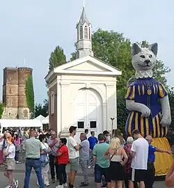 Schellekensfeesten 2024: internationale reuzenstoet met de Franse stadsreus Le Caou uit Merville.
