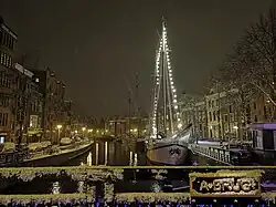 Hoge en Lage der A bij sneeuwval gezien vanaf de Abrug