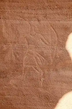 petroglief van een boogschutter