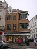 Handels- en appartementsgebouw uit het interbellum