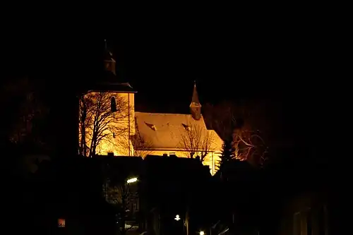 De „Alte Kirche“ (Oude Kerk) in een winternacht