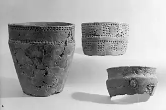 aardewerk met de typerende krassen en putjes