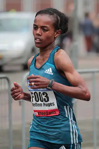 Tijdens de marathon van Amsterdam in 2014