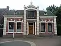Woonhuis in overgangsstijl