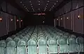 Bioscoopzaal in de Arcade Bioscoop met groene stoelen (1988-1990).