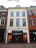 Winkelpand met bovenwoning