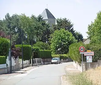 Binnenrijden van het dorp, komende van Pampol