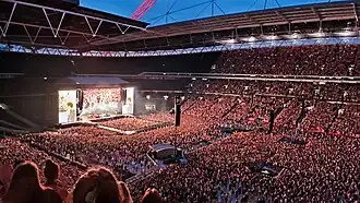 Het publiek tijdens de show in het Wembley Stadion van Londen