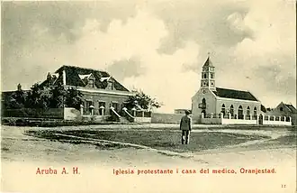 De oude kerk en de dokterswoning (1903)